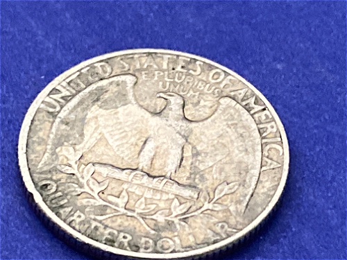 1972-No-Mint-Mark-Quarter-Seems-To-Be-Struck-Over-Another-Coin?